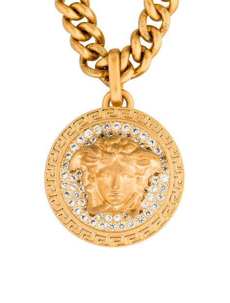 versace medusa pendant.